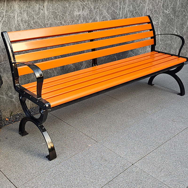 Simple Outdoor Bench in Orange with Back, Metal Frame, and Curved Arm