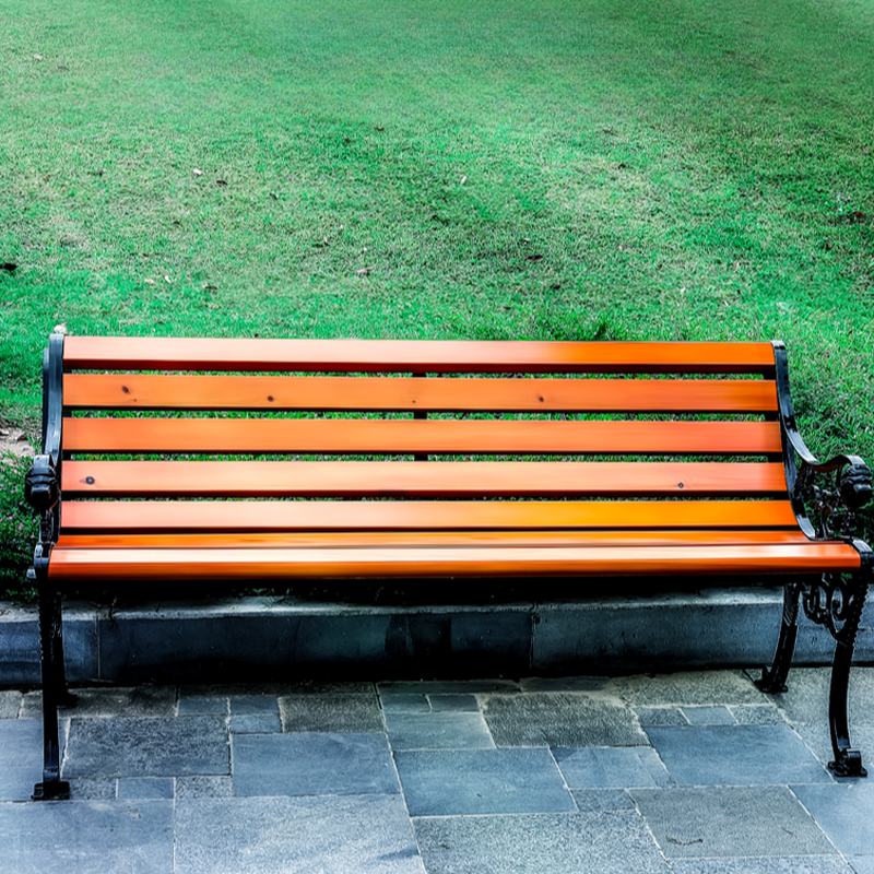 Simple Outdoor Bench with Laminate Tan Back, Curved Arm, and Curved Seat
