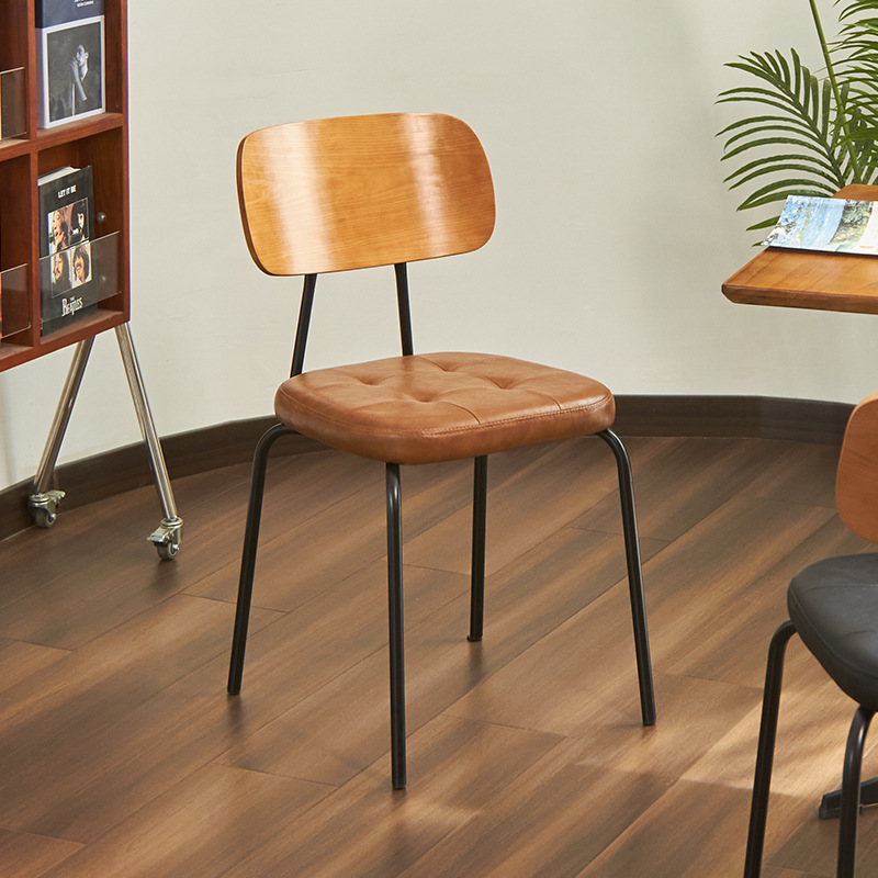 Contemporary Armless Chair with Uncovered Back, Padded Seat, and Midnight Black Alloy Legs