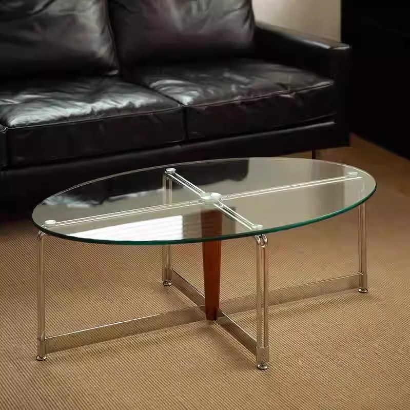 Modish Elliptical Hardened Glass Single Accent Table with Clear Top and Cross-brace Base