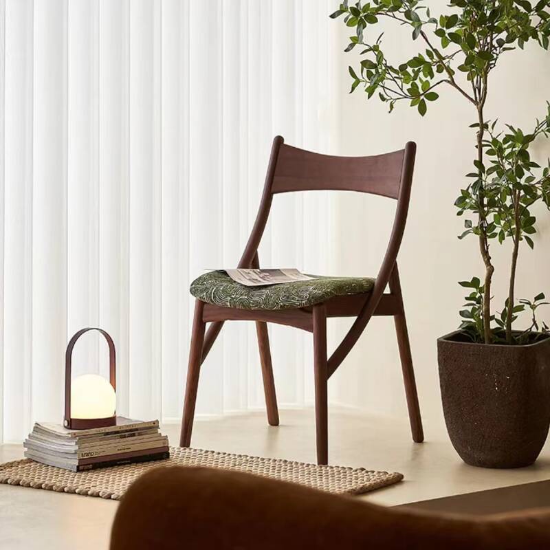 Contemporary Padded Side Chair with Natural Wood Legs and Low Back