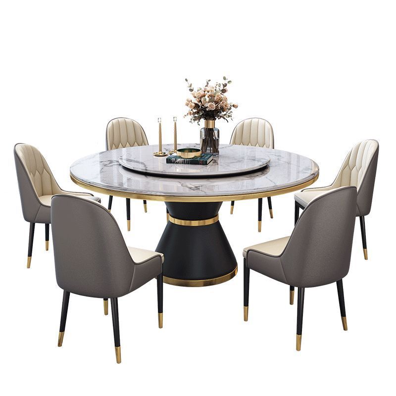 Circular Slate Dining Table Set with Pedestal Base, Upholstered Swivel Chairs, and Upholstered Back